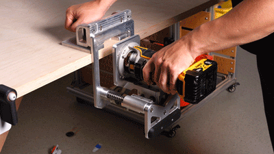 BOND and a trim router cutting a panel-edge mortise