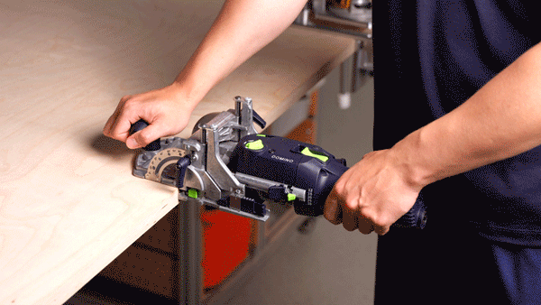 Dedicated loose-tenon joiner cutting a panel-edge mortise
